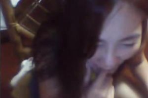 Mature Asian woman shows off her teats and touches her punani