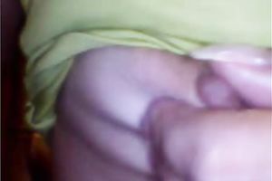 Mature Asian woman shows off her teats and touches her punani