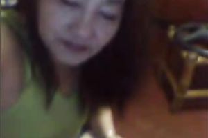 Mature Asian woman shows off her teats and touches her punani