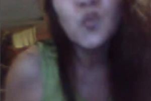 Mature Asian woman shows off her teats and touches her punani