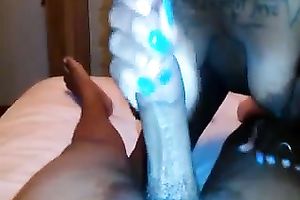 Lusty black skinned blowlerina closed her eyes during the time that giving a ideal blowjob