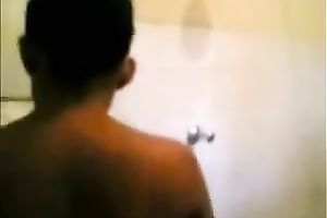 Filming my cute slender Sri Lankan coed GF taking shower