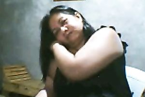 Salacious black-haired mom demonstrates her assets