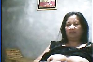 Salacious black-haired mom demonstrates her assets