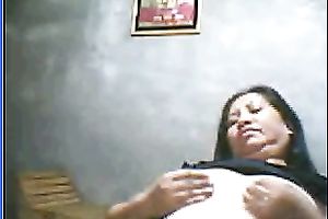 Salacious black-haired mom demonstrates her assets