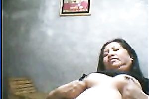 Salacious black-haired mom demonstrates her assets