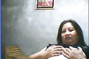 Salacious black-haired mom demonstrates her assets