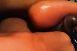 My fleshly cheating wife enjoys rubbing my black ramrod with her feet