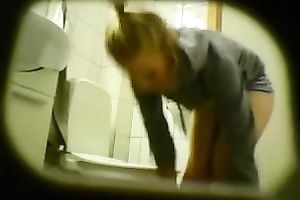 Hidden webcam movie of cute blond girlie of mine pissing in the WC
