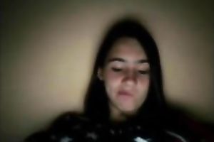 Webcam solo with a dark brown legal age teenager exposing her natural meatballs
