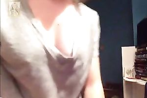 Light haired gal pulled down her grey T-shirt to expose her enjoyable boobies