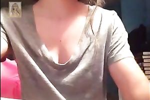 Light haired gal pulled down her grey T-shirt to expose her enjoyable boobies