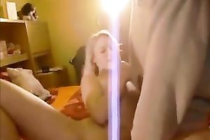 Playful blondie engulfing knob in advance of taking a ride in reverse cowgirl pose