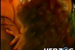 Skinny redhead milf rides a corpulent guy on the ottoman