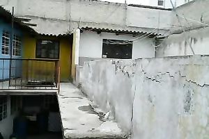 Dirty lady-boy in nylons and small belts masturbates on a roof