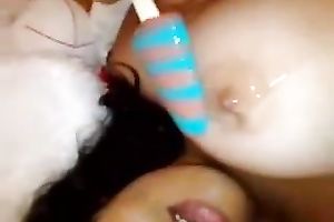 Hot Asian slut with a popsicle was showing off her body