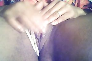 Dark skinned whorable nympho was tenderly rubbing her own soaked love tunnel