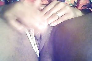 Dark skinned whorable nympho was tenderly rubbing her own soaked love tunnel