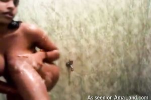 Lovely Indian youthful sweetie in the baths taking shower