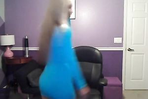 Sassy blond takes off her T-shirt and exposes large full natural bazookas