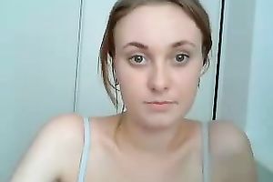 Blonde pale skin cutie in dark lingerie shows off her body