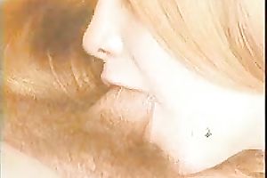 Milfie cute wifey sucks 10-Pounder like it is the majority delightsome lolipop