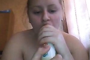 Perverted light haired web camera doxy uses freshener to masturbate