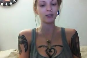 Tattooed whorable preggy with quite hot booty was flashing herself on web camera