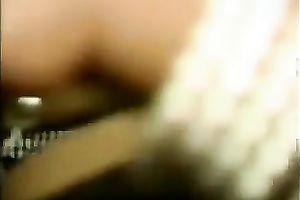 Cock hungry dark milf greedily sucks a large dark ramrod