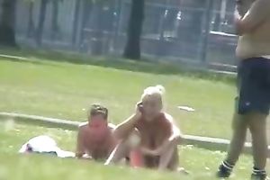 Spying on one torrid breasty dilettante blondie in shiny park topless