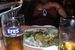 BUsty girl receive a bit also horny and plays with her slit in public restaurent