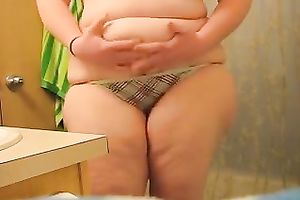 Super obese hottie with enormous ass undresses and shows her cellulite