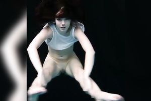 Skinny and tiny doxy underwater exposes her body