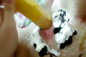 Kinky wicked brunette nympho was using banana and cake for her excited solo
