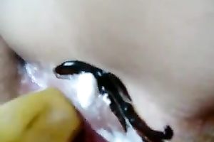 Kinky wicked brunette nympho was using banana and cake for her excited solo