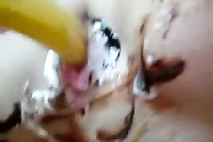 Kinky wicked brunette nympho was using banana and cake for her excited solo