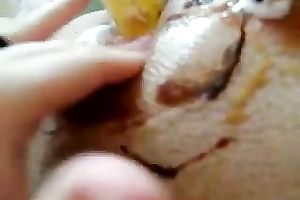 Kinky wicked brunette nympho was using banana and cake for her excited solo