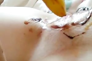 Kinky wicked brunette nympho was using banana and cake for her excited solo