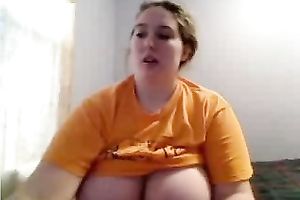 Charming big beautiful woman with heavy hooters exposes her curves and goes wild
