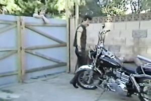 Blonde smutty honey with sunglasses feeding on a penis of a biker