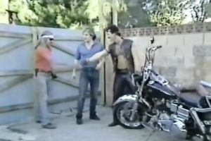 Blonde smutty honey with sunglasses feeding on a penis of a biker