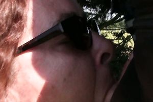 Horny bitch looks better with her sunglasses on and this babe blows like a pro