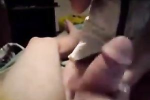 Shiny brunette hair girlfriend strokes my huge jock with her hands