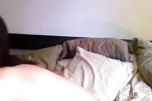 Nasty topless sweetheart is drinking vodka and toying her muff