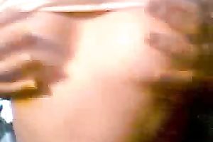 Kinky dilettante girlie sits on the chair and enjoys tickling her wet love tunnel