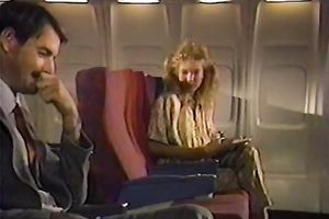 One of the airplane's passanger tempted by a policewoman