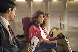 One of the airplane's passanger tempted by a policewoman