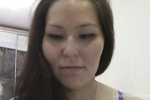 Brown-haired girl shows off her stripped body