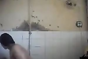 Arab milf takes shower caressing her hot breasty body on camera