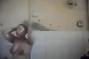 Arab milf takes shower caressing her hot breasty body on camera